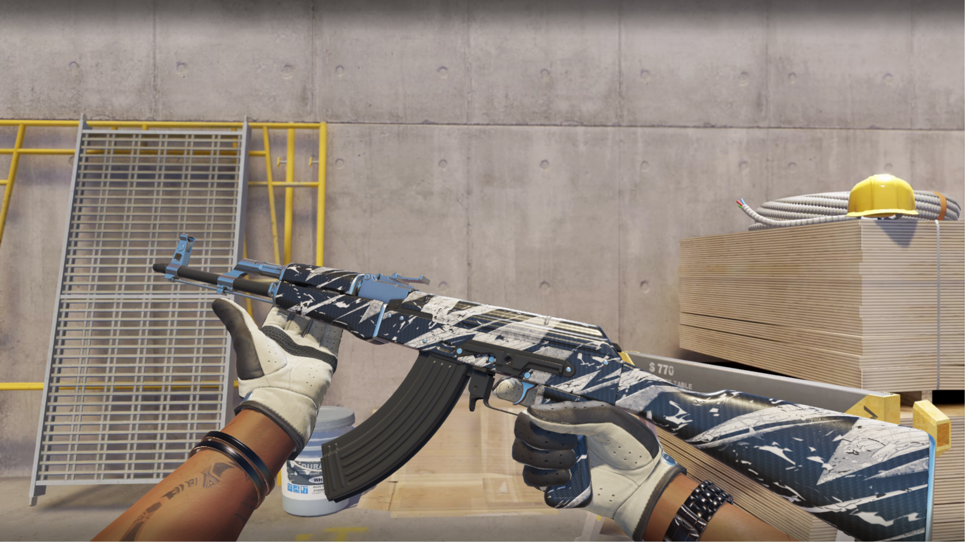 AK-47 | Breakthrough with a black and white shard pattern and light blue metal parts, shown in-game at a construction site