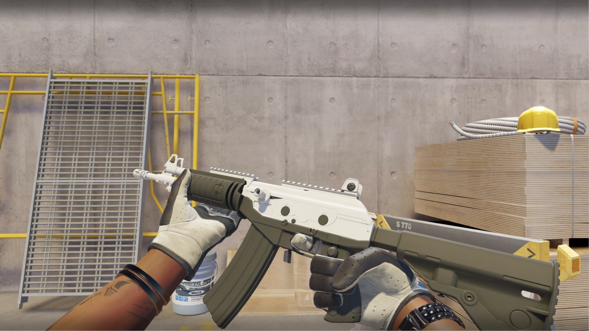 Galil AR | Tuxedo with a white receiver and dark olive stock and magazine, shown in-game at a construction site