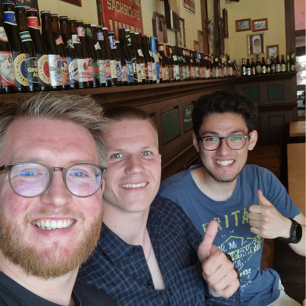 Skinscanner and Pley team members Josh, Niels, and Simon meeting in person at Cologne 2026 major
