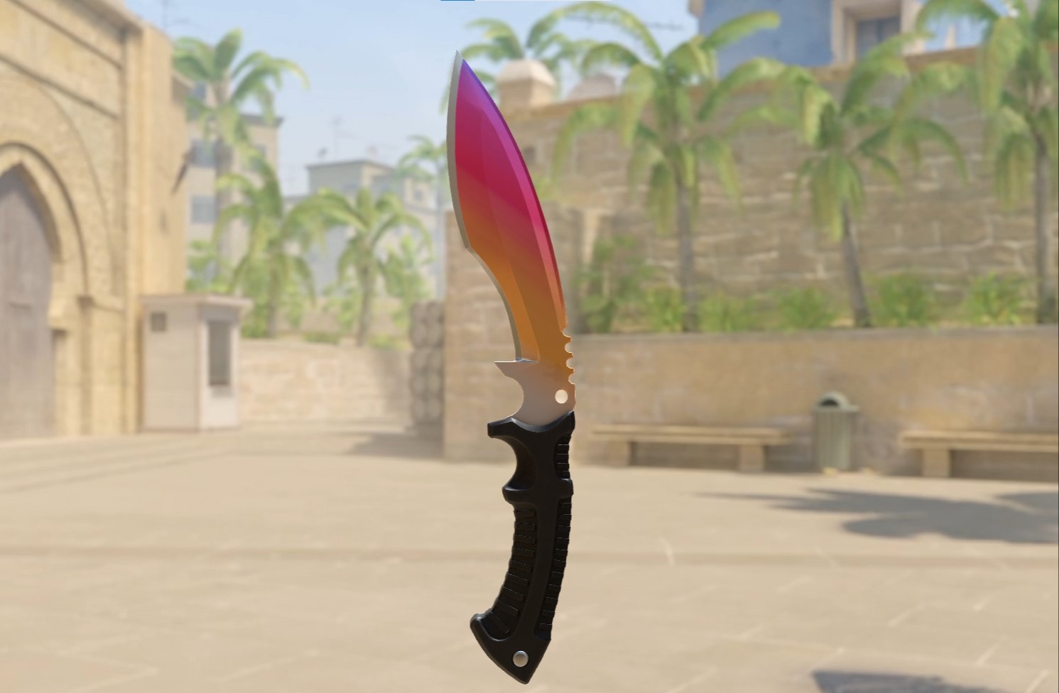 Kukri Knife with a purple, pink, and orange gradient blade and black handle, shown in-game in a sunlit courtyard